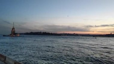The Maiden's Tower and all the landmarks on the other bank of the Bosphorus strait in Istanbul, Turkey.