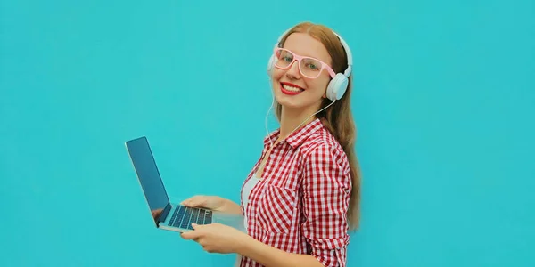 Portrait Modern Young Woman Working Laptop Listening Music Headphones Blue — Stock Photo, Image