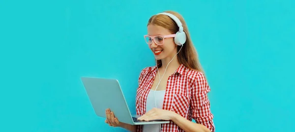 Portrait Modern Young Woman Working Laptop Listening Music Headphones Blue — Stock Photo, Image