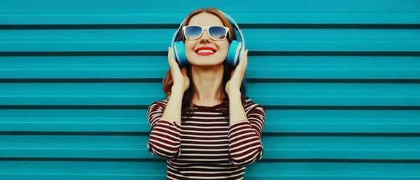 Portrait Happy Smiling Young Woman Headphones Listening Music Colorful Blue — Stock Photo, Image