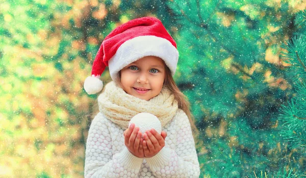 Christmas Portrait Smiling Little Girl Child Santa Red Hat Snowball — Stock Photo, Image