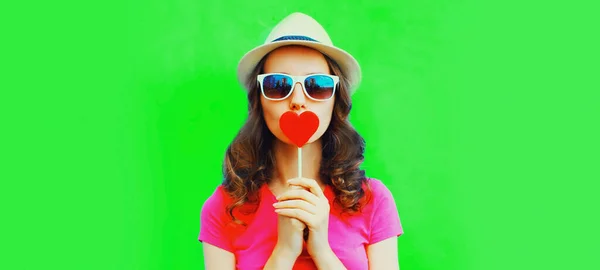 Portrait Young Woman Red Heart Shaped Lollipop Green Background Royalty Free Stock Images