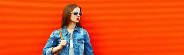 Portrait Young Woman Looking Away Wearing Denim Jacket Backpack Colorful — Stock Photo, Image