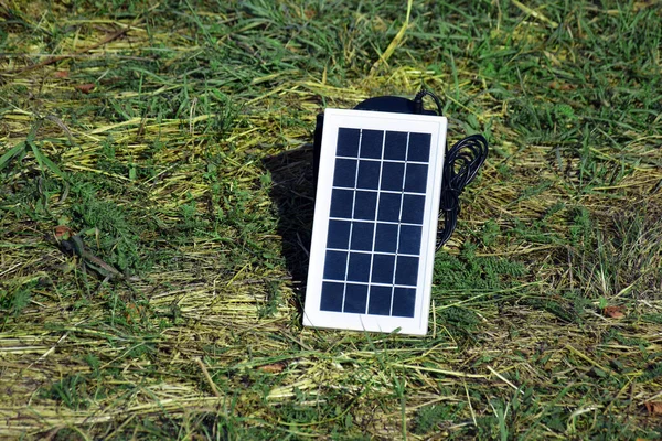 Small Compact Solar Battery Tourism She Charging While Lying Green — Stock Photo, Image