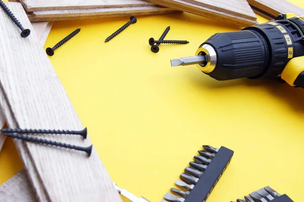 Yellow Black Screwdriver Yellow Background Screws Set Bits Copy Space — Stock Photo, Image