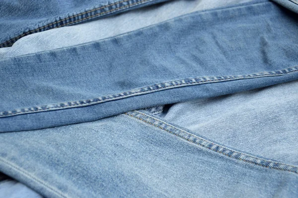 Sacco Pantaloni Jeans Una Pila Sfondo Denim Concetto Acquisto Vendita — Foto Stock