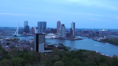 Rotterdam, Netherlands - April 28, 2022: Blue hour cityscape of Rotterdam, Holland-Netherlands, high angle view