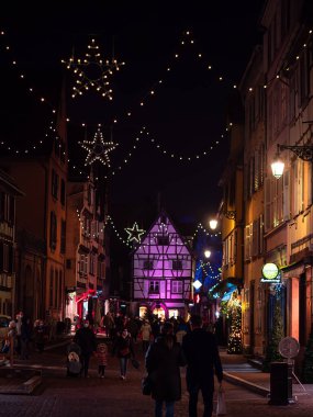 Colmar, France - December 13, 2021: Magical Christmas in Colmar. Amongst the most attractive and atmospheric Christmas markets in all of France. Colorful lights, illuminated facades, decoration.