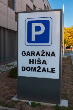 Domzale, Slovenia - August 3, 2022: The modern new garage and parking house in Domzale.