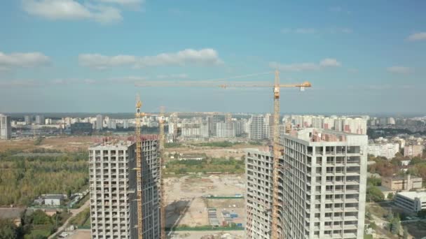 Aerial view of city building cite. Building crane construction skyscraper — Stock Video