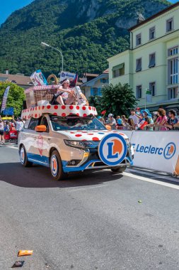 Aigle, Valais Canton, Switzerland -10.07.2022: Passage of an advertising car of E.Leclerc  in the caravan of the Tour of France in Switzerland.