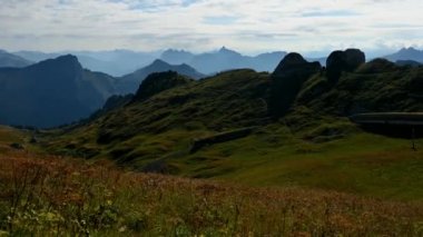Panorama of the mountains in summer. Time lapse of mountains, sky, clouds and train. Landscape of Rochers de Naye, Montreux, Switzerland. Travel destinations.
