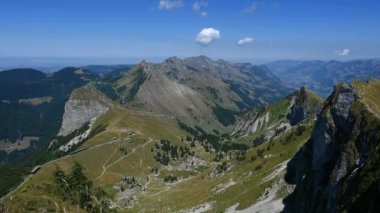 Panorama of the mountains in summer. Time lapse of mountains, sky, clouds. Landscape of Rochers de Naye, Montreux, Switzerland. Travel destinations.