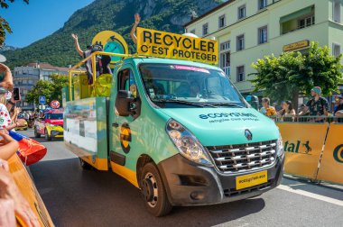 Aigle, Valais Canton, Switzerland -10 July, 2022: Passage of an advertising car of ecosystem in the caravan of the Tour de France in Switzerland. Promotion activity.