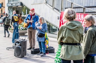 İsveç 'in Stockholm kentinde Irak' taki savaş suçlarını ortaya çıkardığı için İngiltere 'de tutuklu bulunan gazeteci Julian Assange' ı desteklemek amacıyla düzenlenen gösteri..