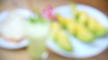 Turn focus to Milk melon Smoothie in glass with Roast bread