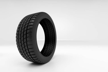 Bir araba lastiği beyaz arka planda istiflenmiş ve izole edilmiş. Geniş açı. Resim 3B.