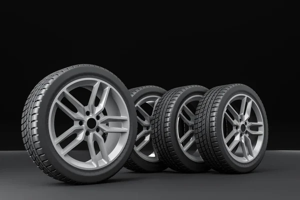 Four Car Tires Stacked Black Background Patterned Blue Red Lights — Stock Photo, Image