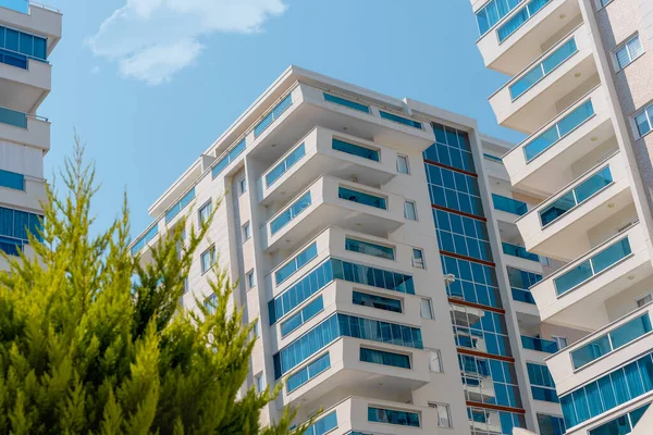 Several new newly built block residential buildings. Modern architecture against the sky.