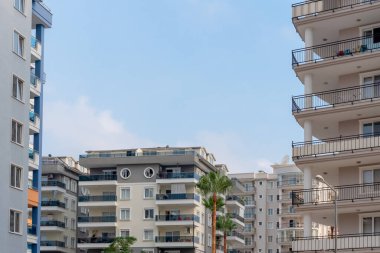 Several residential buildings against the blue sky. Copy space.