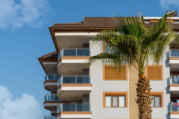 The exterior of an apartment building against the sky. Residential real estate in Turkey.