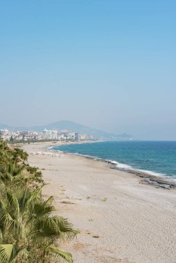 Sea coast of the Mediterranean Sea in Alanya, Turkey. Vertical shot.