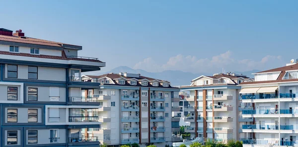 Cityscape of a residential area with modern apartment buildings in Turkey.