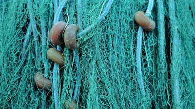 Arkaplan olarak dizilmiş yeşil balıkçı ağı