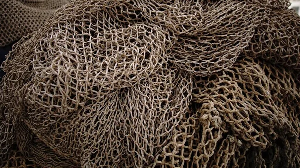 素朴な漁網を背景に ロイヤリティフリーのストック写真