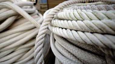 stacked and rolled industrial ropes