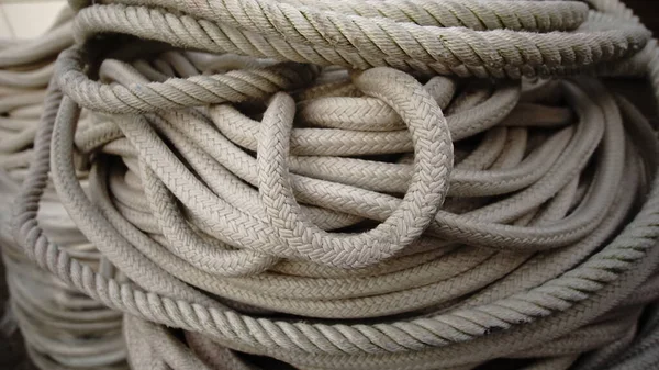 Industrial Coiled Rope Stacked Background — Stockfoto