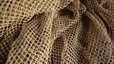 Arkaplan olarak balık ağı dokusu sallanıyor