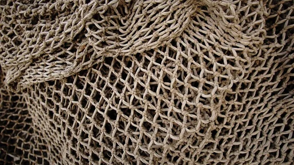 Δίχτυα Αλιείας Στοιβάζονται Κυματίζει Φόντο — Φωτογραφία Αρχείου