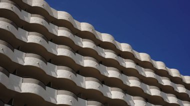 building facade with undulating balconies