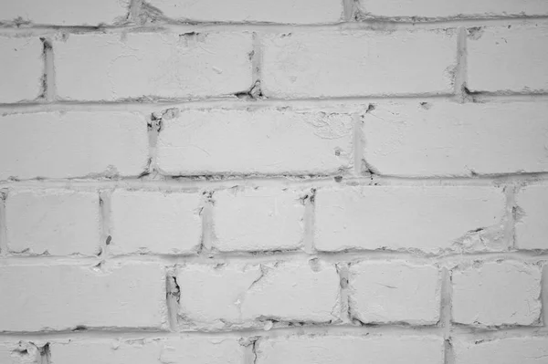 Brick wall close-up. The brick wall painted in grey. Place for text. Empty space.
