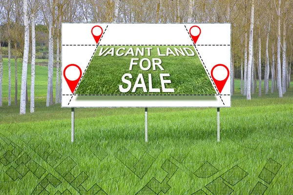 Advertising billboard in a rural scene with Vacant Land for Sale written on it for the construction of residential buildings - Construction industry in a vacant lot concept with an imaginary cadastral map.
