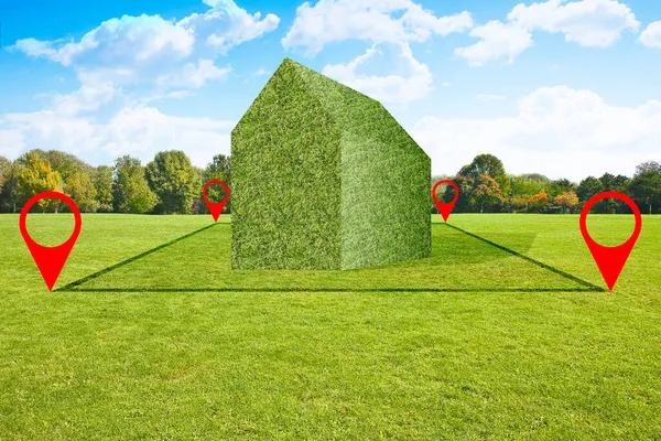 Land plot management - real estate concept with a vacant land on a green field available for building construction and housing subdivision in a residential area for sale with a green home