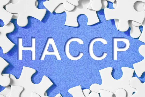 Haccp 食品業界における食品の安全性と品質管理 ジグソーパズル形状のコンセプトイメージ — ストック写真