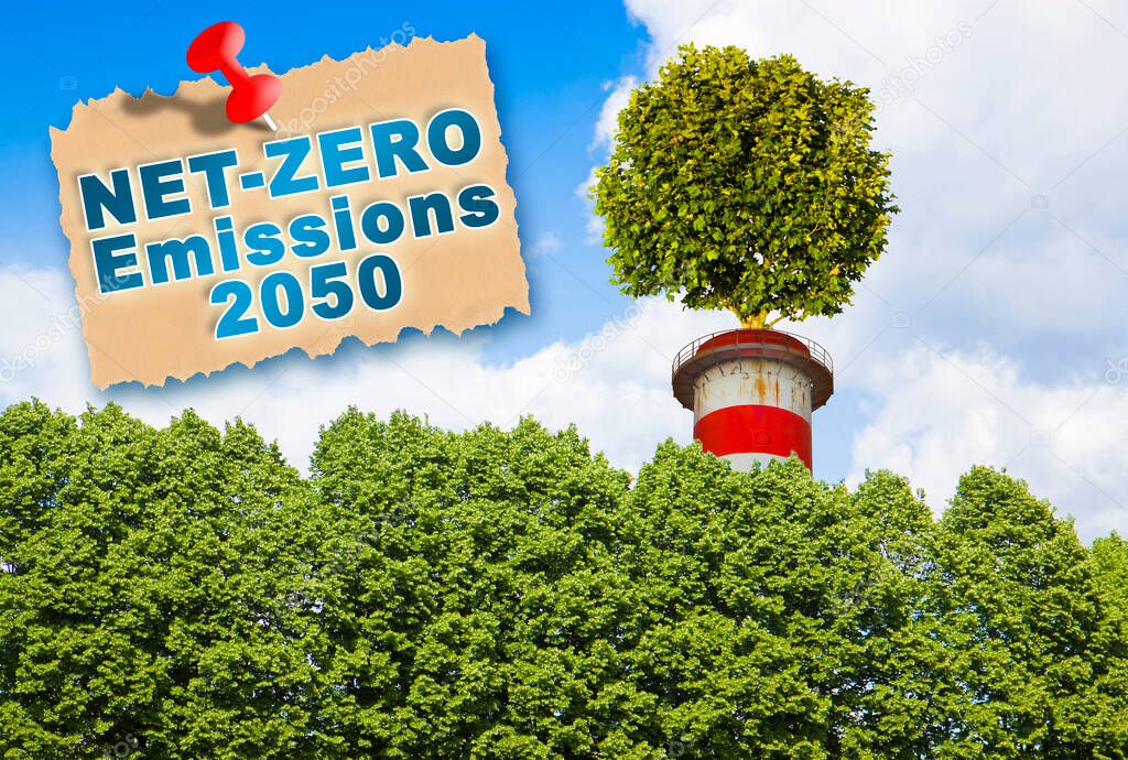 European Union sets new climate law: net-zero emissions are now a target for 2050 - Carbon Neutrality concept against a woodland background and tree on top of a chimney