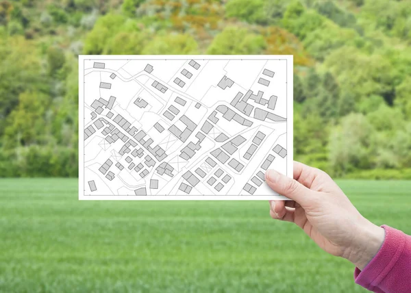 건설에 수있는 지역에 가지고 부동산 가상의 지도에 엽서를 손으로 — 스톡 사진