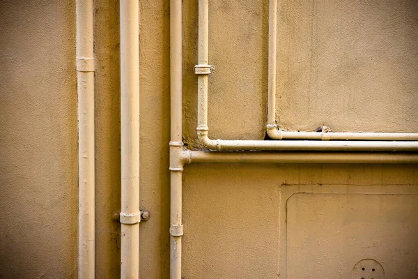 Old Water Pipes Front Wall — Stock Photo, Image
