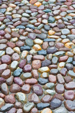 Coloful yuvarlak çakıl zeminin detayları, su geçirmez, İtalyan meydanında parlayan taşla..
