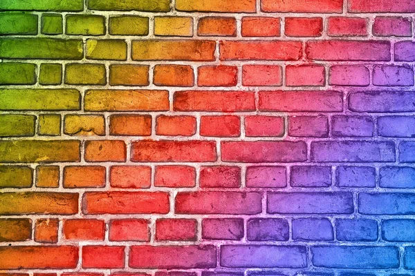 Colorful brick wall background with multi colored rainbow effect