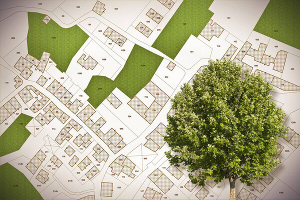 Воображаемая кадастровая карта территории со зданиями, дорогами, земельным участком и бесплатной зеленой землей, доступной для строительства. Образ концепции. 