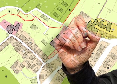 Imaginary General Urban Plan with indications of urban destinations with buildings, roads, buildable areas and land plot with female hand writing
