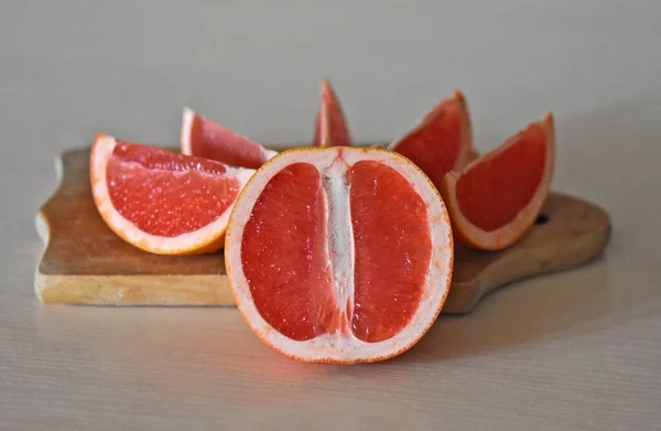 Slice Grapefruit Wooden Surface — 图库照片