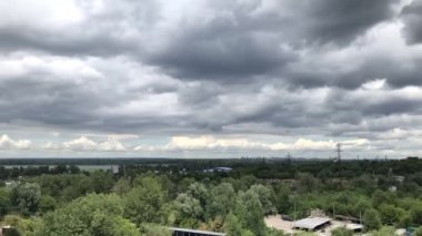Cumulus clouds running on the sky