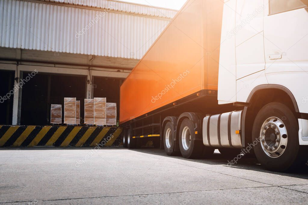 Semi Trailer Trucks with Cargo Container Parked Loading at Dock Warehouse. Shipment. Packaging Boxes Supply Chain. Shipping Warehouse. Lorry. Industry Cargo Freight Truck Transport Logistics.