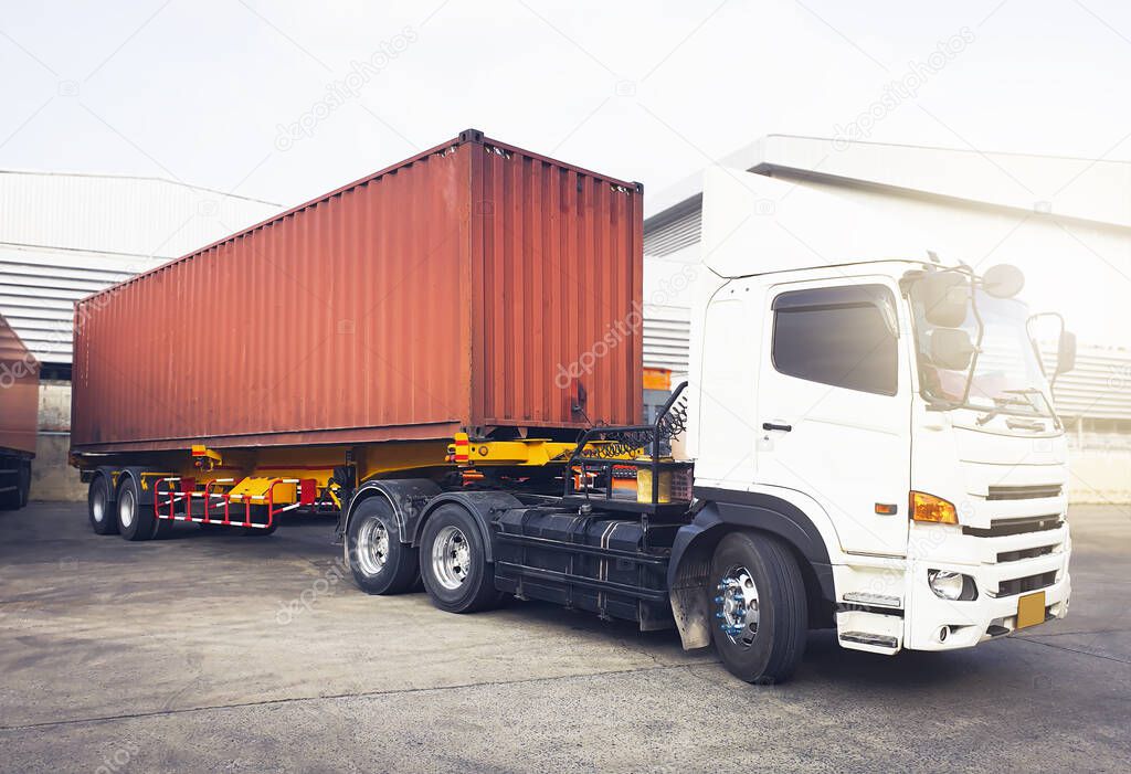Semi Trailer Truck Parking at The Warehouse. Shipping Cargo Container. Lorry. Industry Freight Truck Logistics Cargo Transport.