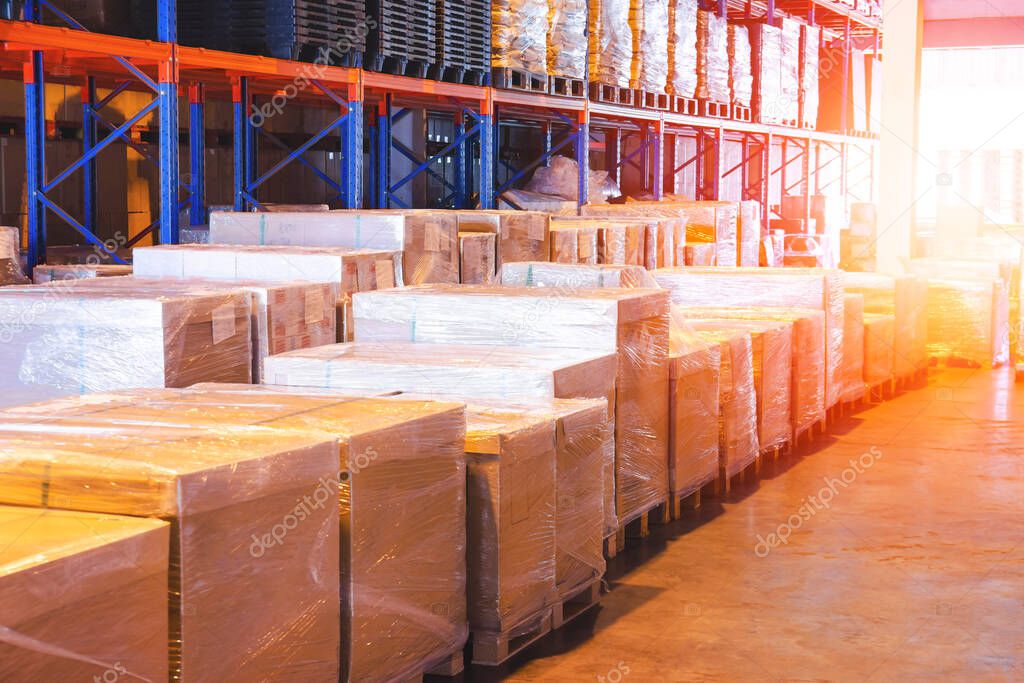 Packaging Boxes Wrapped Plastic Film on Pallets in Storage Warehouse. Supply Chain. Storehouse Commerce Shipment. Shipping Warehouse Logistics.